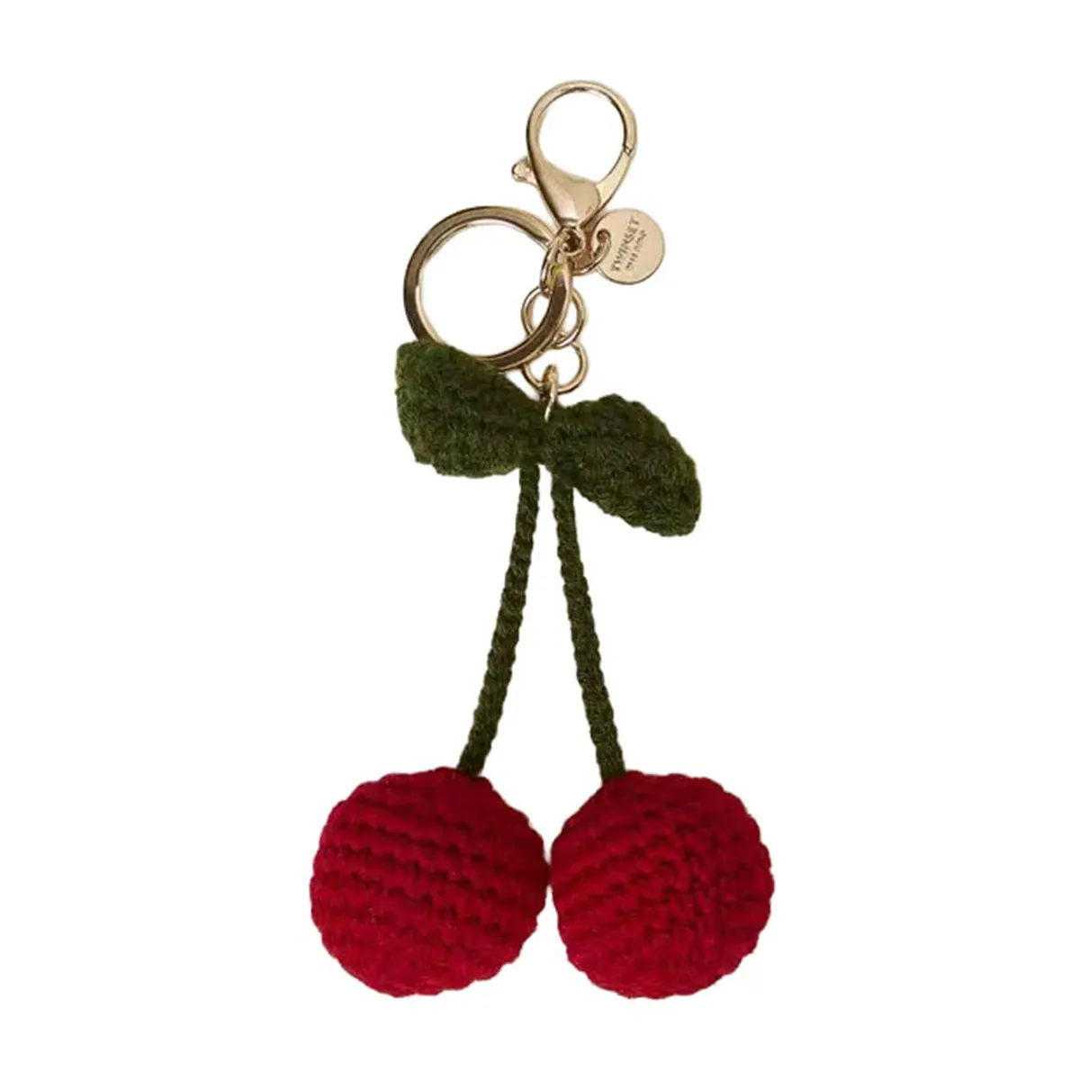 Knitted keychain with decorative cherries