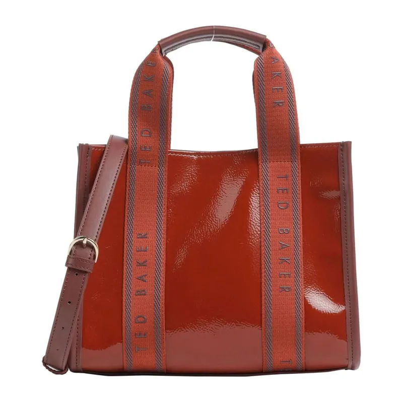 Celiane Webbing Patent Handbag