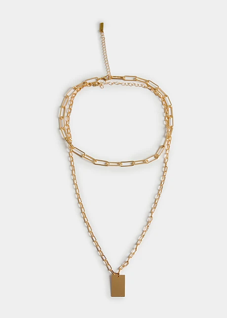Δύο αλυσίδες σε χρυσή όψη