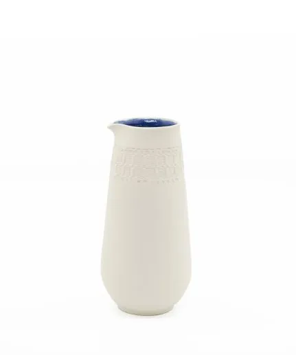 Handcrafted cylinder pitcher made of clay with embossed spathoto pattern