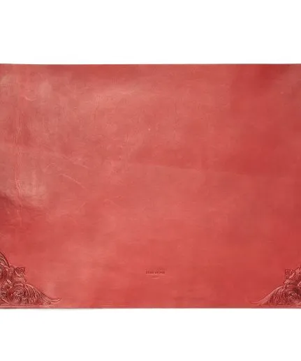 Leather desk-mat with embossed details on edges