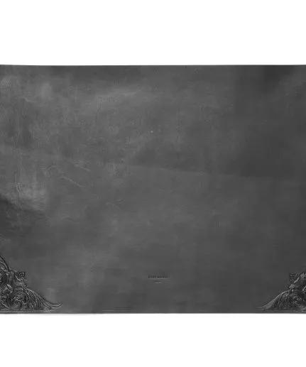 Leather desk-mat with embossed details on edges