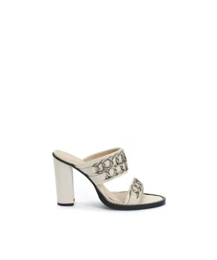 Leather mule decorated with metallic braids