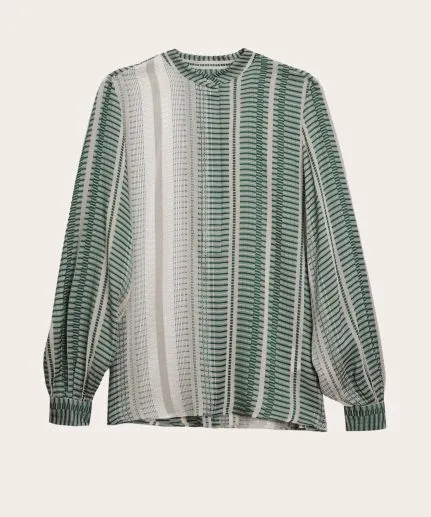 Long sleeve textured silk blouse.