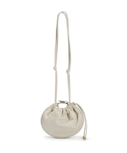 Mini circular leather bag with cord details
