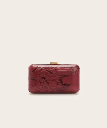 Small embossed leather clutch with metallic frame